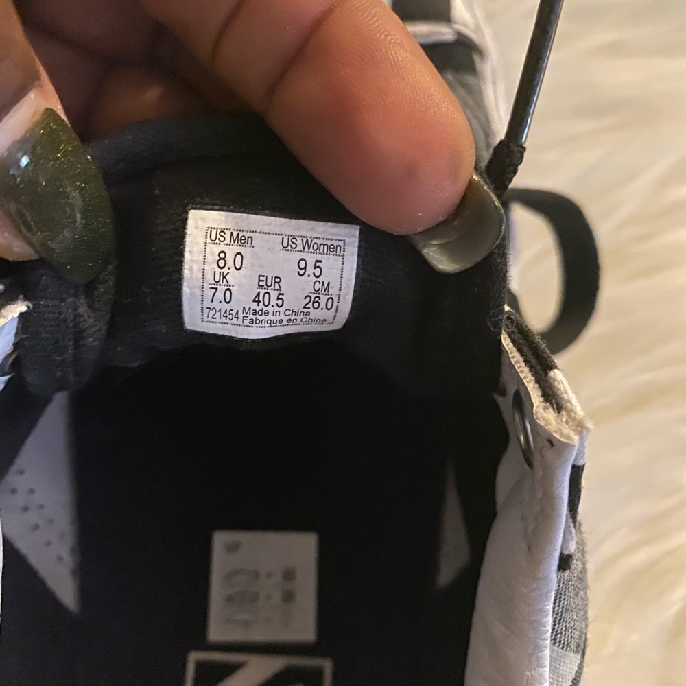 Checkered vans, black and white